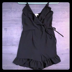 Black ruffle romper